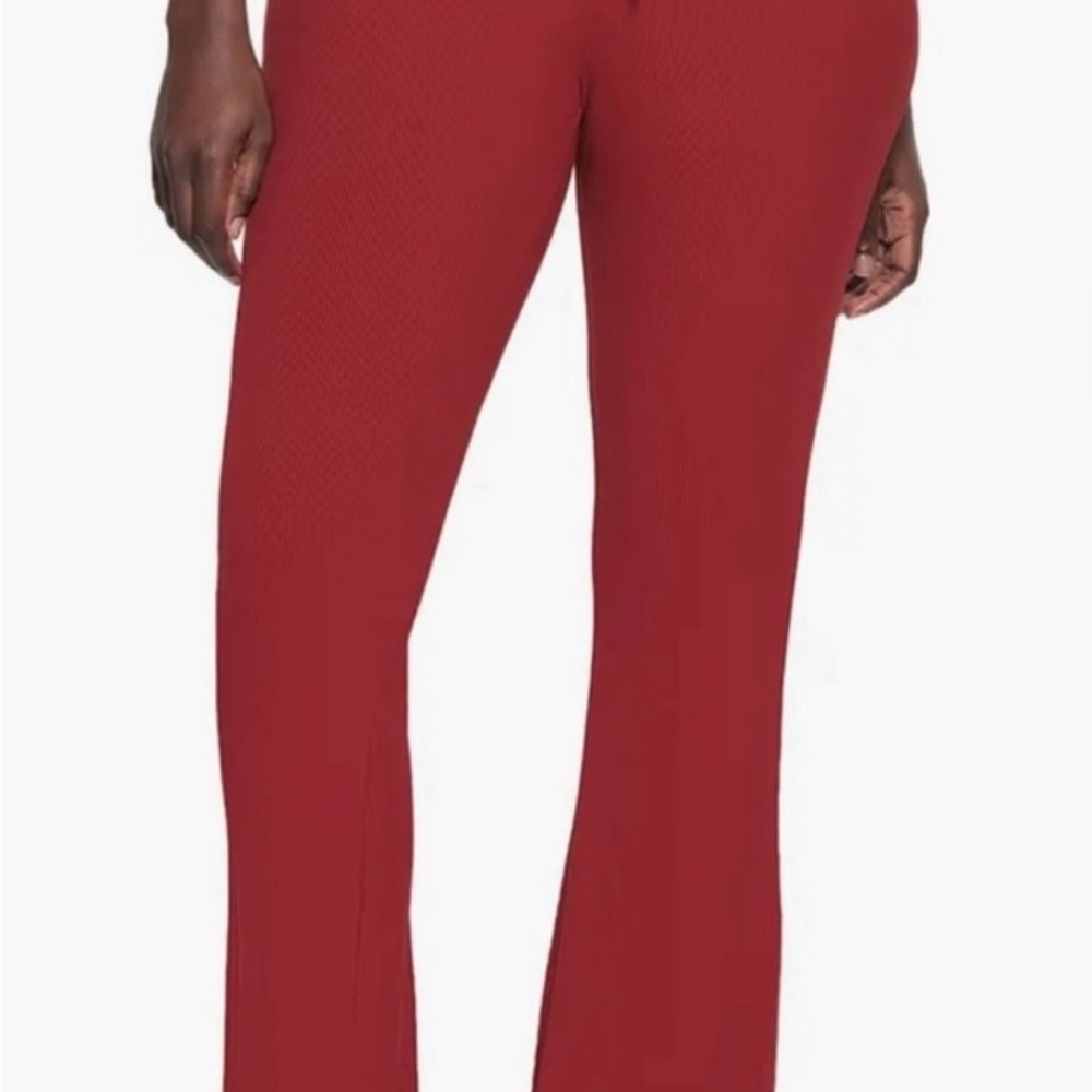 Skims soft lounge pants in brick color